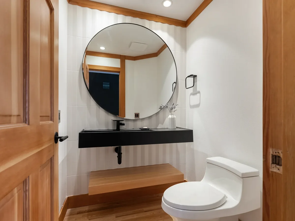 black & fluted-tile powder room in Redmond, WA · King County
