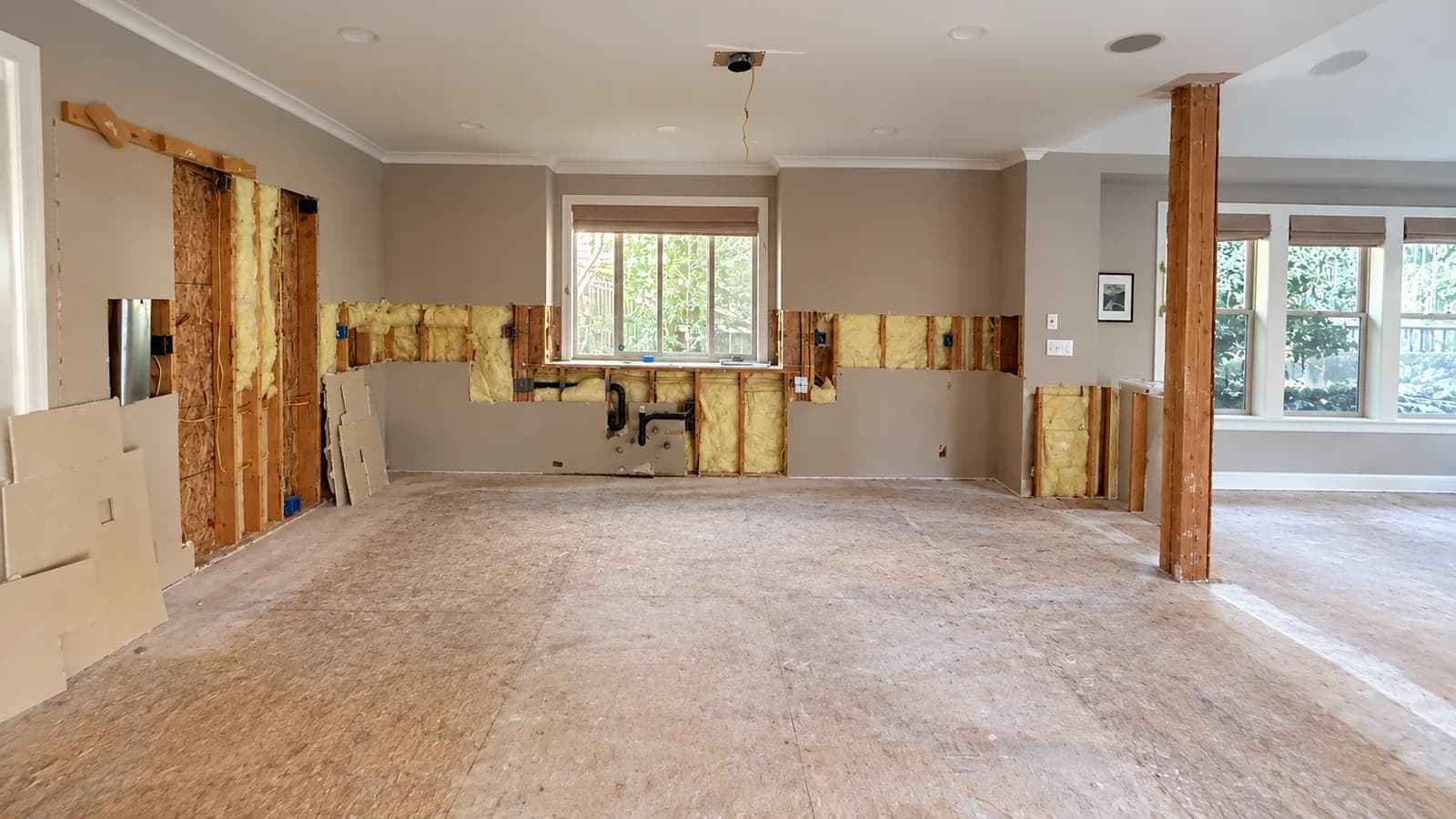 Kirkland kitchen during demolition — down to studs and subfloor