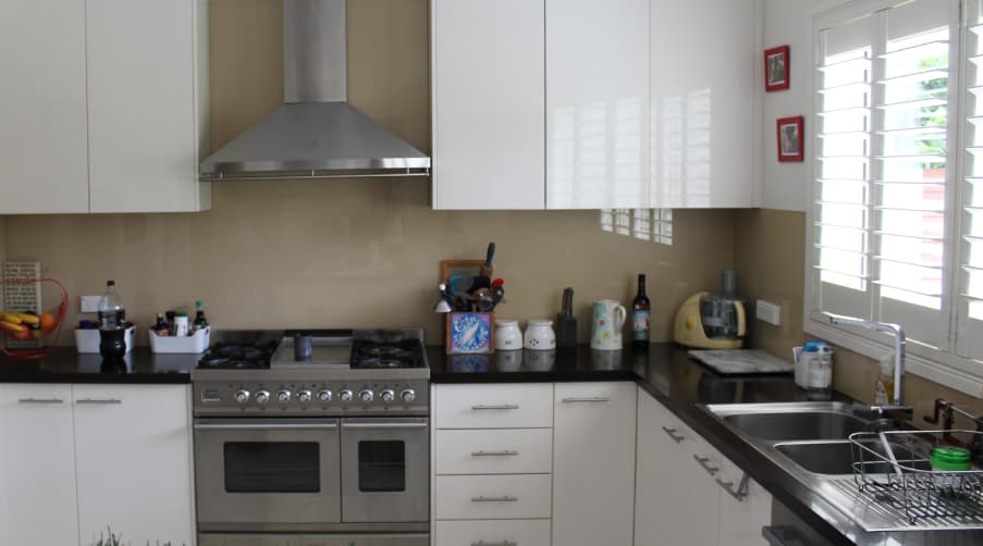 Kitchen before renovation — outdated layout, Renton WA