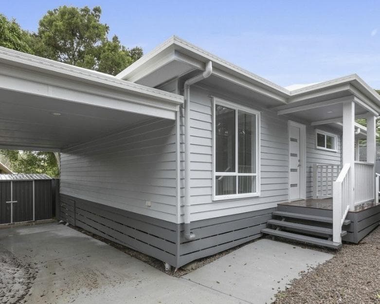 Backyard Cottage with Wraparound Deck