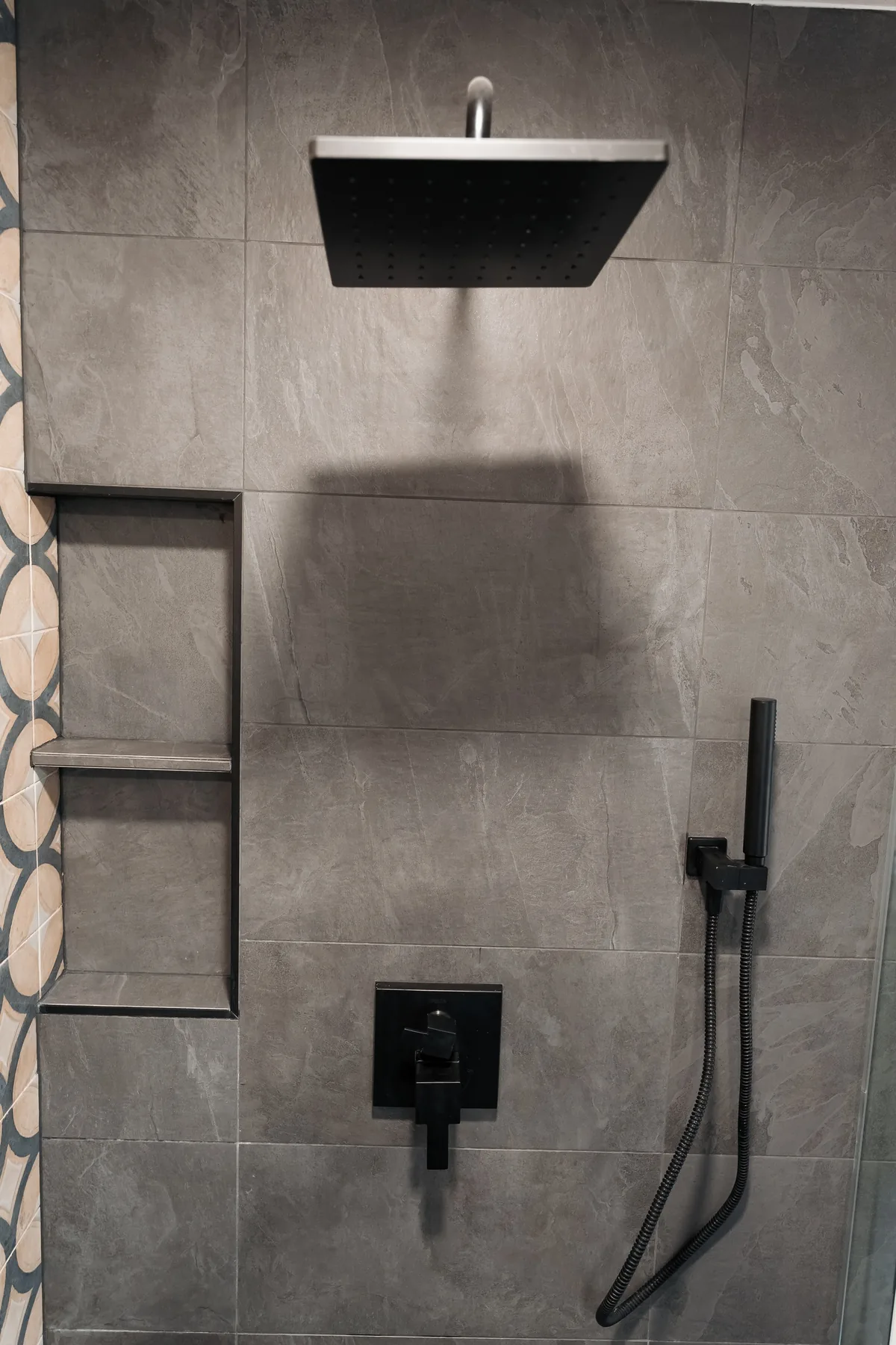 Matte-black rain head, handheld and tiled niche on gray tile, Capitol Hill bathroom