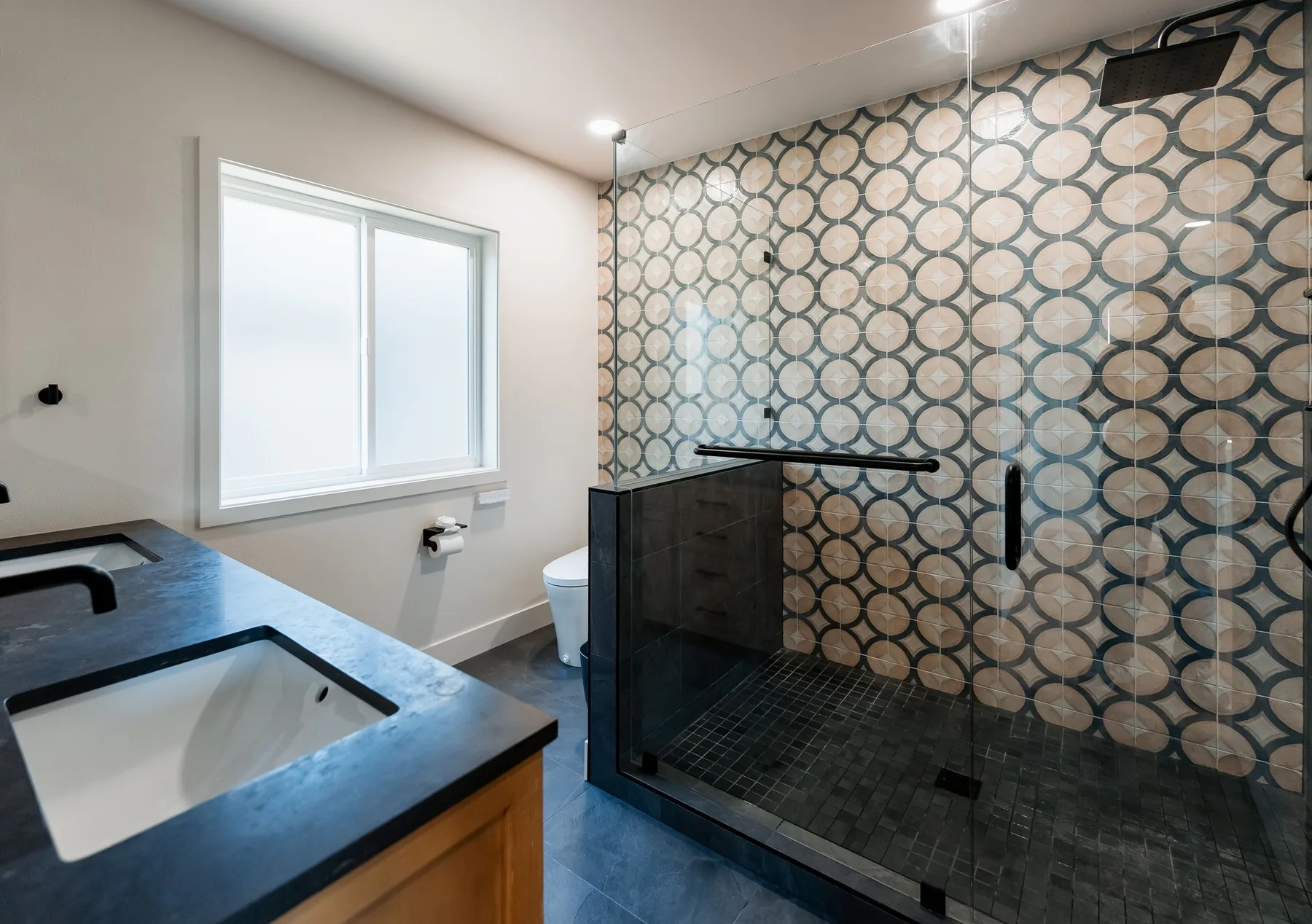 Walk-in shower with patterned porcelain on the same Capitol Hill floor