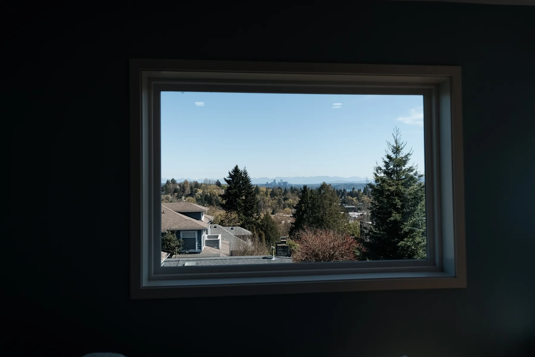 View of the lake and mountains through a new second-floor window