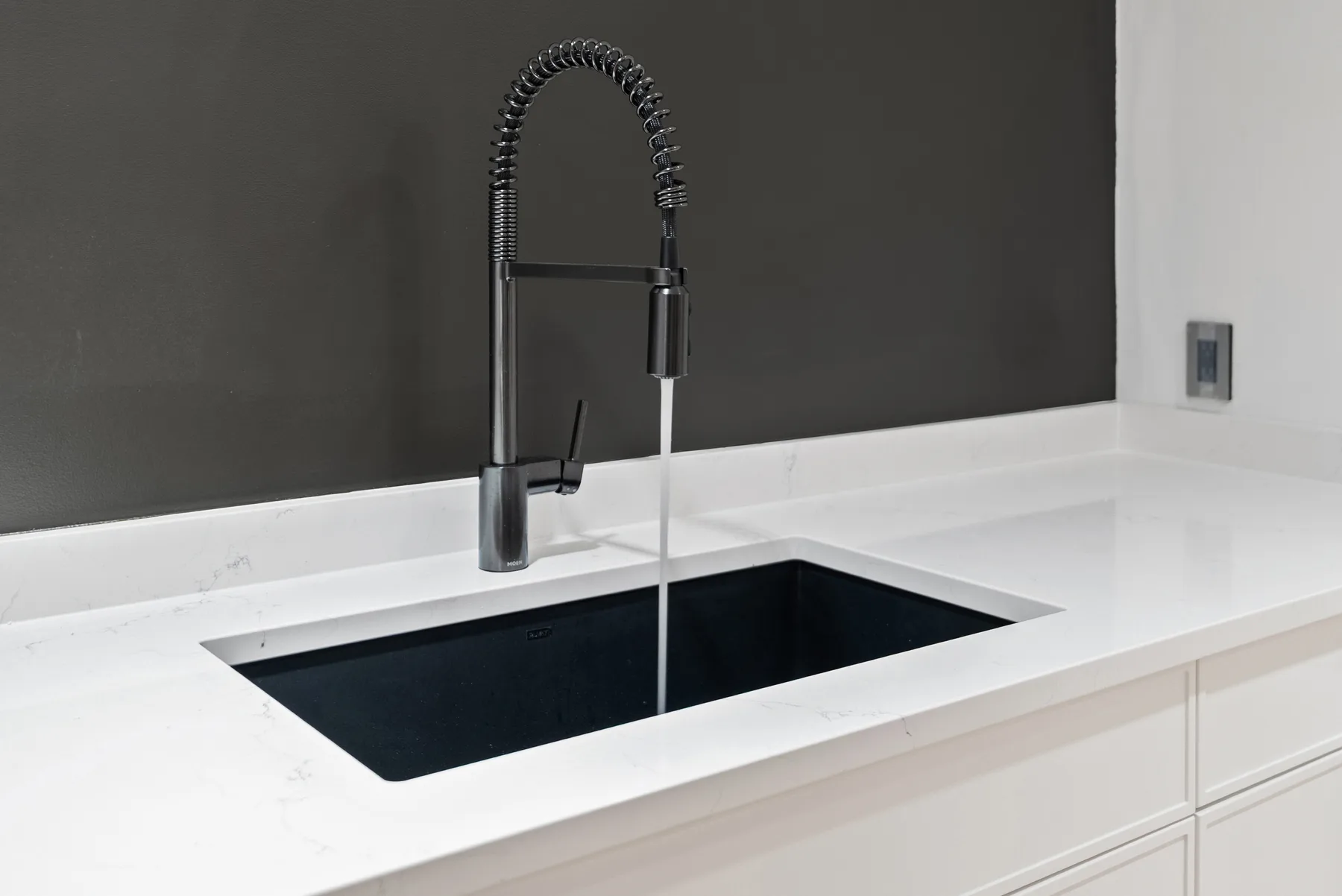 Deep utility sink with pro-style black faucet, Redmond laundry