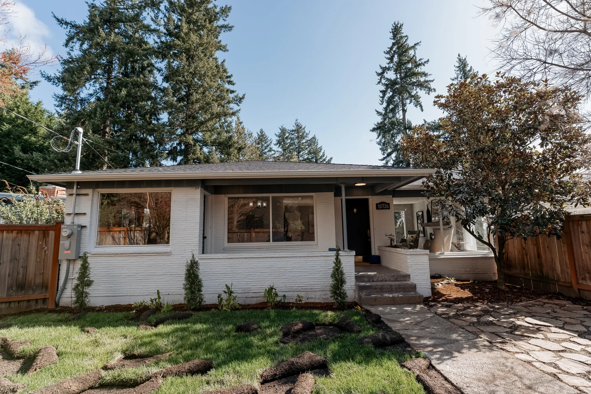 Front exterior of the restored Seattle home with a new roof