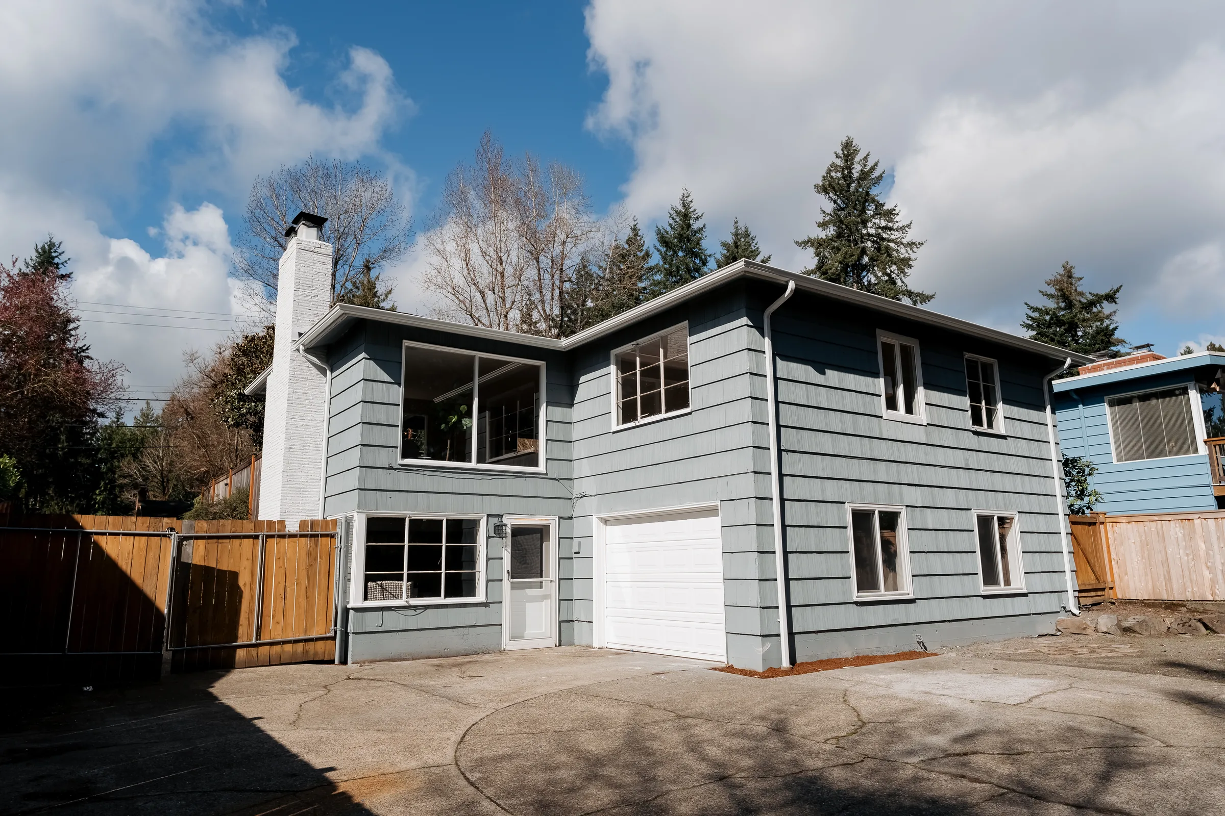 Restored two-story Seattle home with a new roof after storm-damage restoration by Evercrest