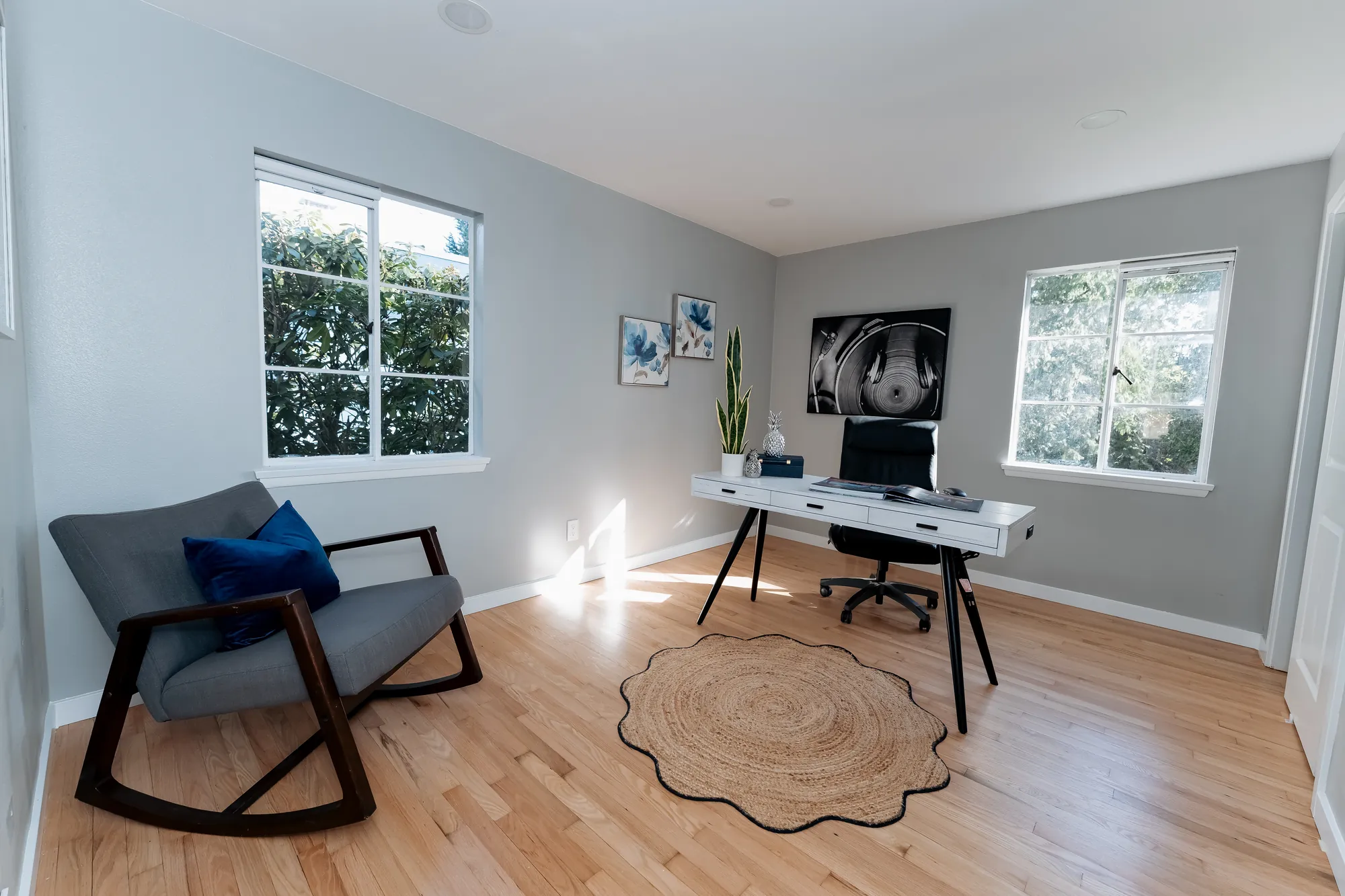 Upstairs office and flex room with hardwood floors after the second-floor rebuild