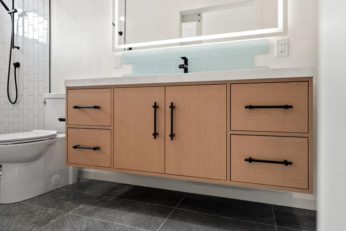 Primary bathroom with in-unit laundry in the Seattle View Ridge ADU addition